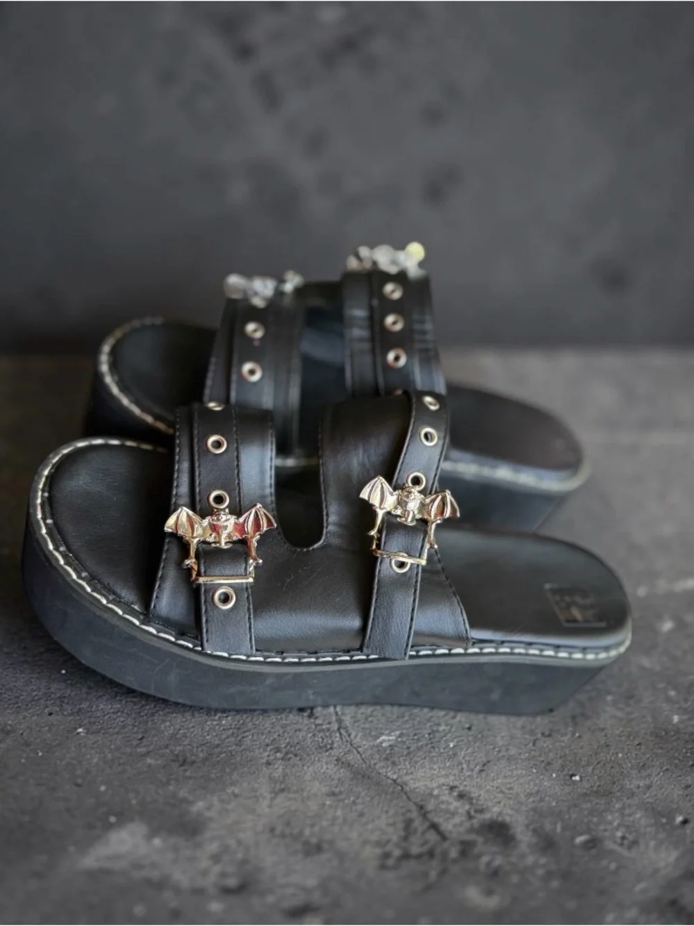 Black Leather Studded Slide Sandals with Bat Buckles